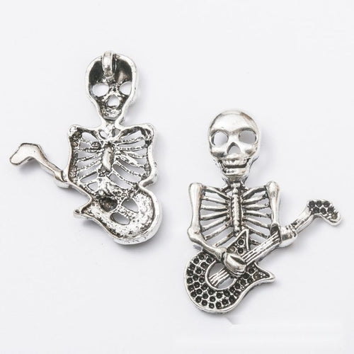 Closer front view of the skeleton guitar player shape and surface details.