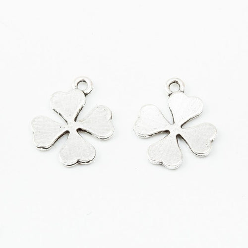 Close view of the a simple four-leaf clover silhouette with softly rounded leaves