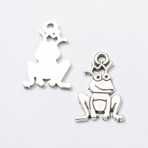 Front and reverse views of the crowned frog prince charm