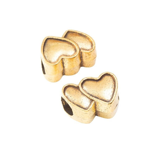 Front and reverse details of double heart beads on a white background