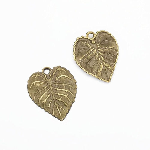 Heart-Shaped Leaf metal design front and back view on a light background