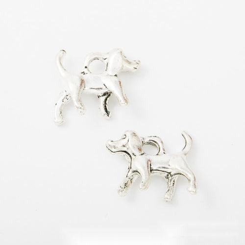Close view showing the front and reverse details of the mixed dog breed charms