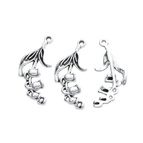Metal trumpet flower charm, front detail shown in the product image