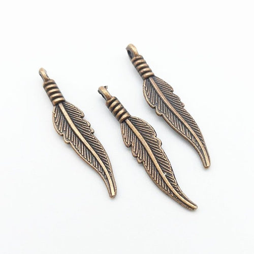 Close view showing the front details of the slender feather charms