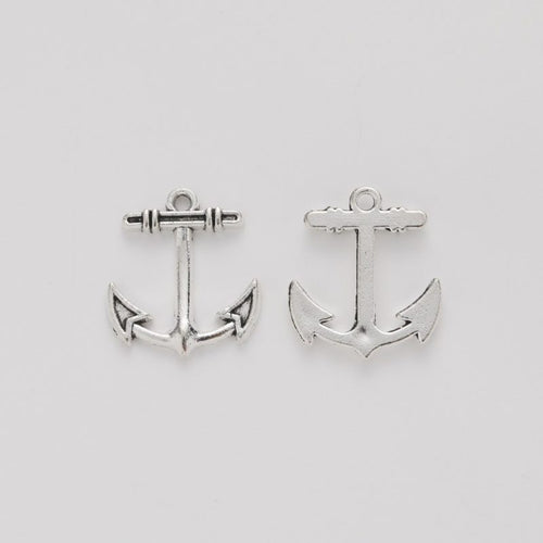 Front and reverse views of the small pointed anchor charm