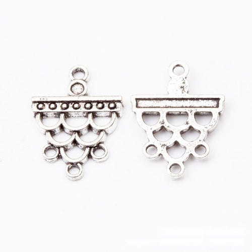 Assorted chandelier connector finishes arranged on a white background