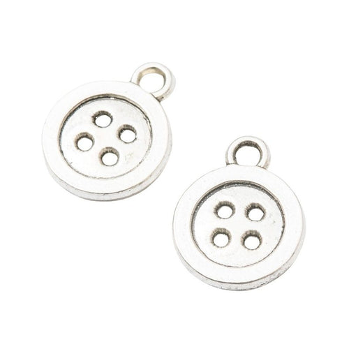 Detailed view of round four-hole button metal component