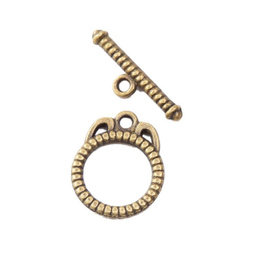Round ridged toggle rings paired with textured bars shown from the front on a white background.