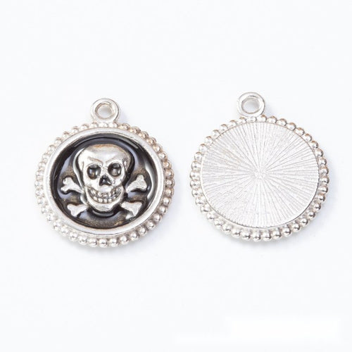 Close-up view of the skull and crossbones enamel round metal charms showing its front and reverse metal details.