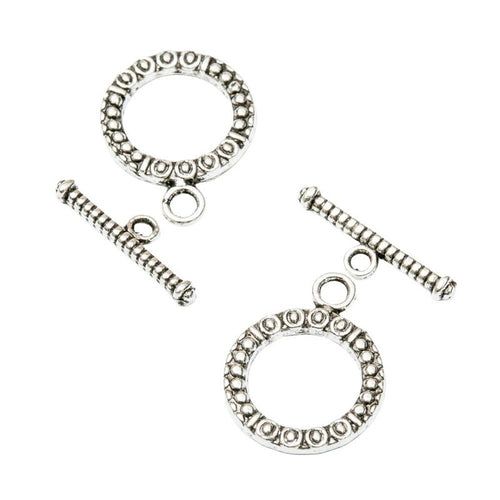 Toggle Clasp metal component, reverse and front details on a white background.
