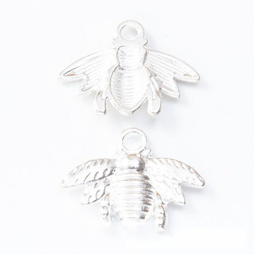 Front detail and finish comparison of the striped bee charm