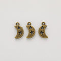 Cutout Crescent Moon and Star Charm in Two Finishes view 2