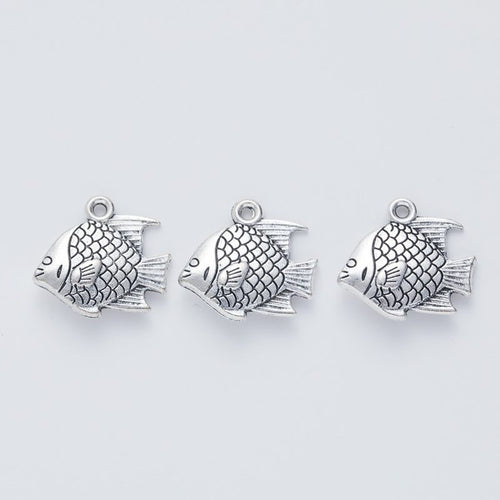 Crosshatched Fish metal piece showing front-facing surface and relief detail
