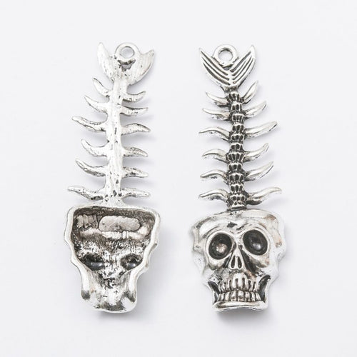 Skull Fishbone Charm shown from the front in contrasting finishes