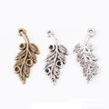 Curled Feather Leaf Charms in Antique Bronze and Silver view 2