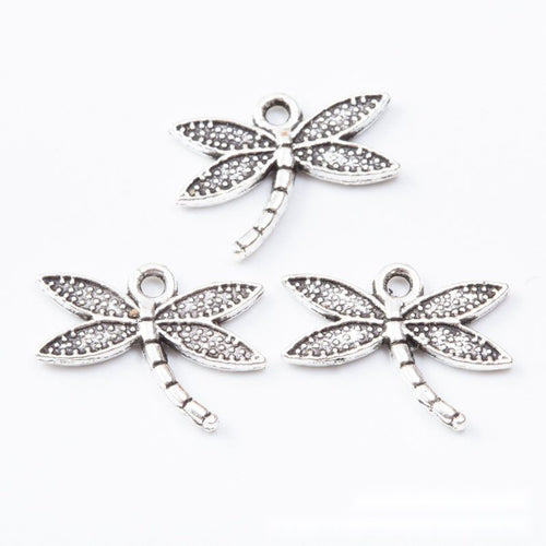 Front detail view of one pictured finish of openwork dragonfly charms