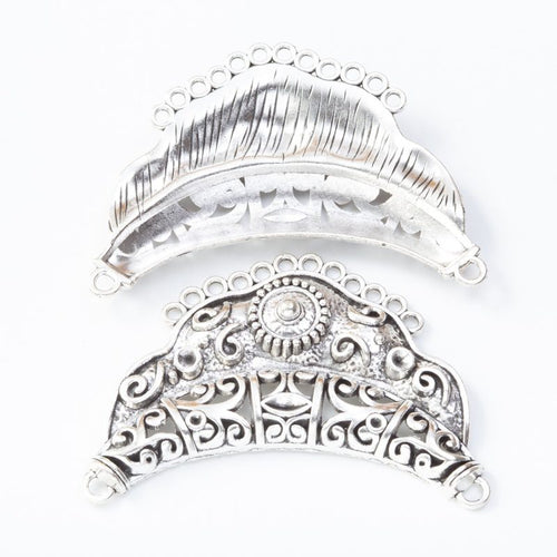 Close view of Crescent Multi Loop metal shape and surface detail