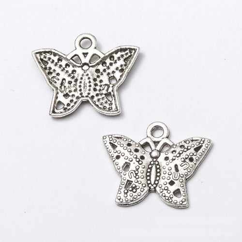 Filigree Butterfly metal design front and back view on a light background