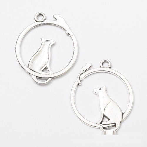 Cat In Circle metal component, reverse and front details on a white background.