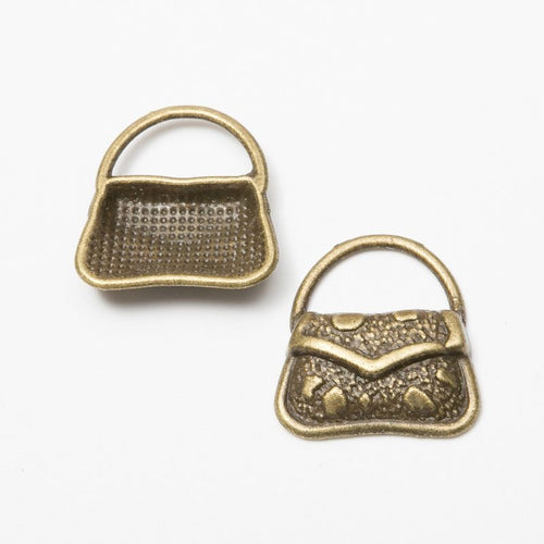 Patterned Handbag Charm Pendant front detail showing a curved handle and embossed front panels