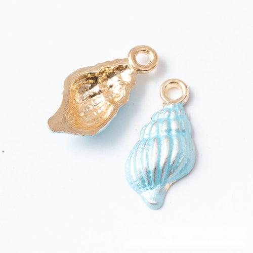 Close product view of the fluted conch shell pendant charm in four glossy colors