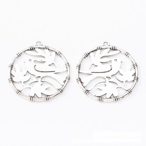 Alternate image of bird cutout charm showing available finishes and form