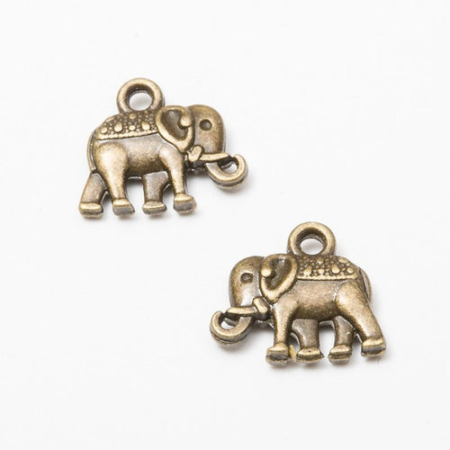 Front detail and finish comparison of the decorated elephant charm