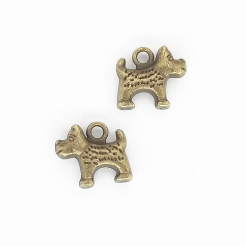Patterned Puppy metal piece showing front-facing surface and relief detail