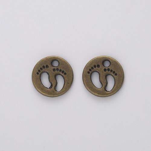Footprint Disc metal component, reverse and front details on a white background.