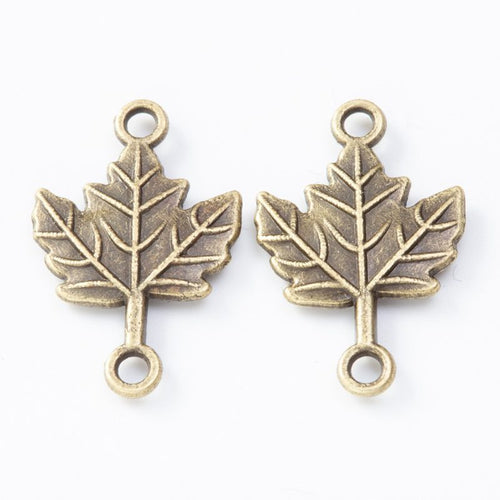 Close view showing the front and reverse details of the double loop maple leaf connector