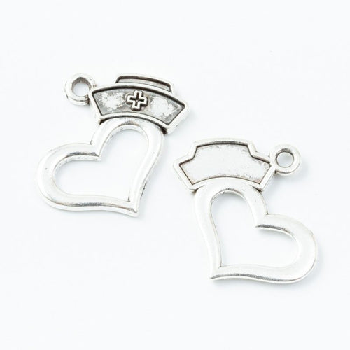 Front and reverse views of the nurse cap heart outline metal charms in two finishes