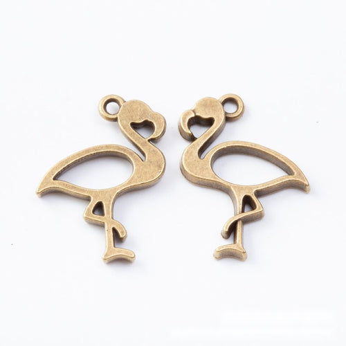 Close front view showing the shape and recessed details of the open flamingo frame charms