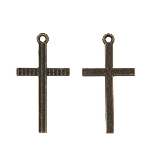 Front and reverse view of the simple cross charm