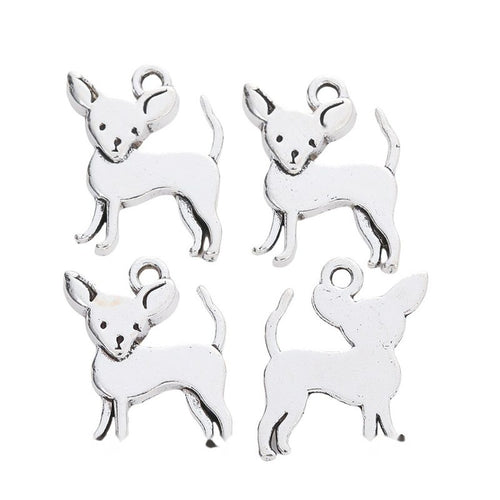 Grouped view of the pointed ear dog metal charm from the front
