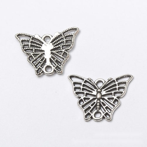 Closer front view of the openwork butterfly connector shape and surface details.