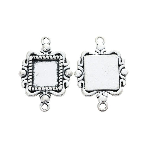 Metal ornate square connector setting, front detail shown in the product image