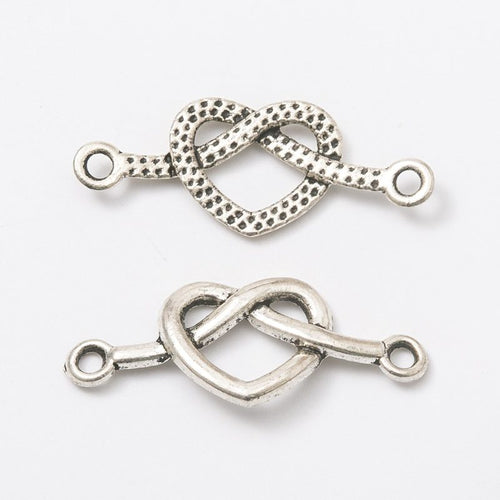 Interlocking Heart Connector front detail showing two interlocking heart outlines and loops at both ends
