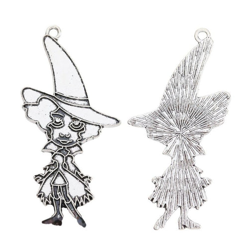 Closer view of the cartoon witch charm surface and hanging loop