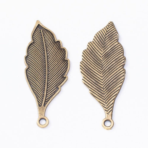 Long Veined Leaf metal design front and back view on a light background