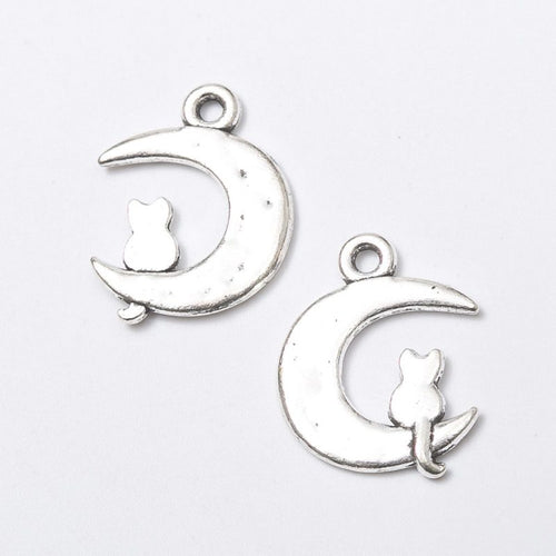 Close view of the cat crescent moon showing a small cat silhouette set into a smooth crescent