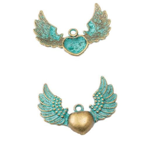 Front and reverse details of the winged heart metal connector charm