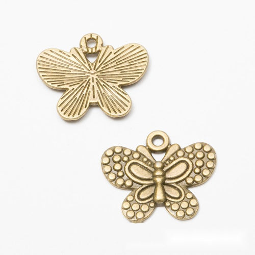 Front and reverse views of the dotted butterfly metal charms in two antique finishes