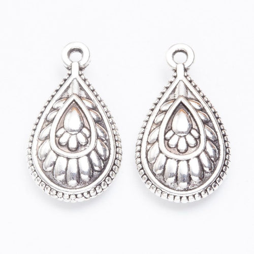 Close view of the front details on teardrop peacock feather pendants
