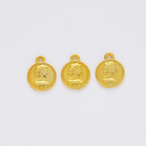 Angled detail views of cameo portrait coin charms