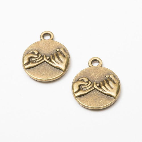 Additional front and reverse view of the pinky promise hand charm
