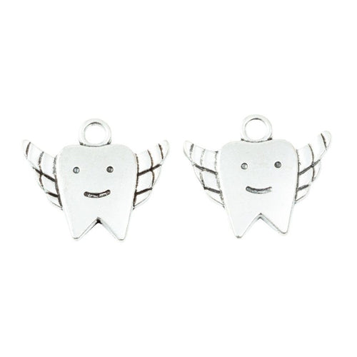 Close view of winged tooth charm