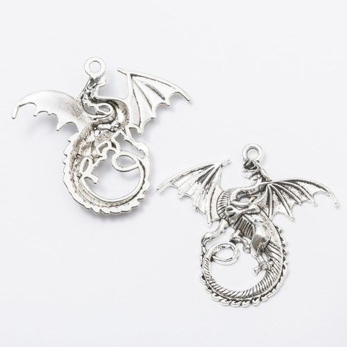 Close view showing the front details of the coiled dragon charms