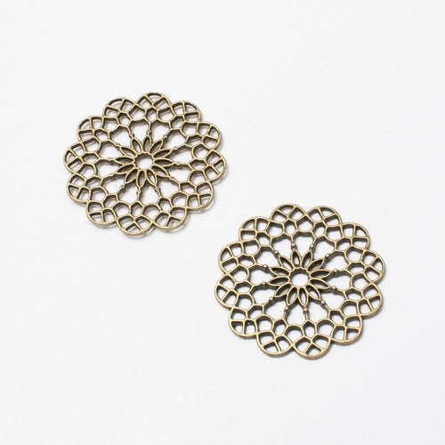 Product photo 2 of the round filigree flower connector highlighting its layered round flower lattice with loops on oppos