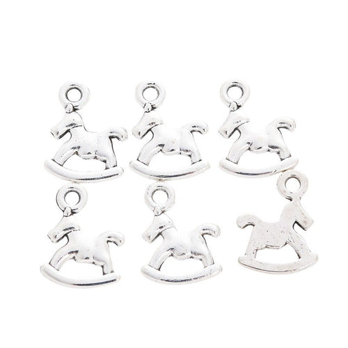 Grouped view of the rocking horse metal charm from the front