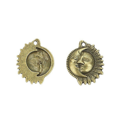 Sun and crescent moon face metal component, front and reverse detail on white